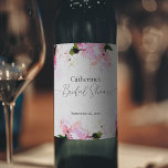 Étiquette Pour Bouteilles De Vin Watercolor Pink White Peony Flowers Bridal Shower<br><div class="desc">Romantic personalized bridal shower wine bottle label featuring watercolor pink and white peony flowers on a creamy white background. The text is fully customizable. To change it use the Personalize option. For more changes, such as changes to the font, font color or text layout, use the Edit design tool option....</div>