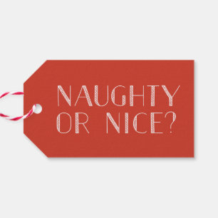Étiquette rouge vilaine ou Nice de cadeau de Noë