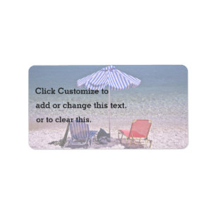 Étiquette Scène de plage avec chaises de repos