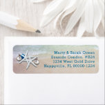 Étiquette Starfish Christmas Return Adresse Beach Life Étiqu<br><div class="desc">Une adresse de retour pour ceux qui vivent au bord de la plage. Starfish et ornements design avec une adresse imprimée bleu foncé et assez d'espace pour ajouter 4 lignes si nécessaire. Les vagues qui arrivent sur le rivage sont l'image arrière - plan de ces étiquettes maigres.</div>