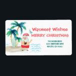Étiquette Tropical Beach Père Noël Christmas Retours Adresse<br><div class="desc">Ajoutez un peu de plaisir et de festivité à votre courrier de vacances avec ces étiquettes d'adresse de retour de Noël mignonnes. Père Noël est en vacances, surf et détente sur une plage d'île tropicale. Avec ses orteils dans le sable, un verre à la main, des palmiers et une brise...</div>