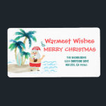 Étiquette Tropical Beach Père Noël Christmas Retours Adresse<br><div class="desc">Ajoutez un peu de plaisir et de festivité à votre courrier de vacances avec ces étiquettes d'adresse de retour de Noël mignonnes. Père Noël est en vacances, surf et détente sur une plage d'île tropicale. Avec ses orteils dans le sable, un verre à la main, des palmiers et une brise...</div>