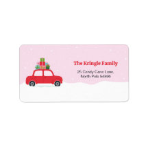 Voiture rouge adorable avec des cadeaux de Noël en