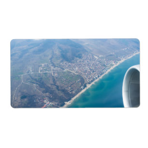 Étiquette Vue sur le littoral à travers la fenêtre de l'avio