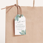 Étiquettes-cadeau Accueil du Mariage de feuillage tropical<br><div class="desc">Attachez ces îlots chic à vos sacs d'accueil mariages pour accueillir vos invités dans un style élégant. Les étiquettes blanches présentent un feuille de fronde de palmier à l'aquarelle tropicale en vert luxuriant qui regarde du haut et du bas, avec "bienvenue" et vos noms et la date du mariage, ainsi...</div>