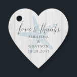 Étiquettes Cadeau Amour et Merci Rustic Beach Starfish Forme de coeu<br><div class="desc">Heart Shape Favor Tag pour un mariage rustique à la plage avec une illustration vintage d'étoiles de mer et une police de serif classique et élégante calligraphie écriture manuscrite "amour et merci" avec des noms et date mariage. Utilisez l'outil de conception pour modifier les couleurs ou les polices afin de...</div>