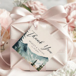 Étiquettes Cadeau Aquarelle Montagnes Et Pins Mariage Merci<br><div class="desc">Montrez votre gratitude en style avec les Aquarelles Montagnes et Pins Mariage Favor Tags. Ces étiquettes présentent une scène d'aquarelle sereine de montagnes et de pins, donnant un ton tranquille. Un message de "Merci" sincère, écrit dans la typographie moderne, ajoute une touche personnelle à vos faveurs de mariage. Conçus à...</div>