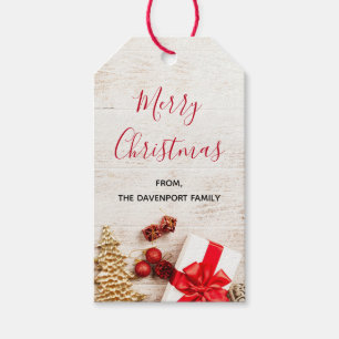 Étiquettes-cadeau Articles thématiques de Noël sur une planche en bo