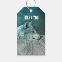 Beau loup gris dans un Merci de forêt foncée