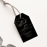 Étiquettes-cadeau Calligraphie d'or romantique | Black Wedding Favor<br><div class="desc">Ces calligraphie dorée romantique noir mariage marque cadeau de faveur sont parfaits pour un mariage simple. Le design classique moderne comprend des tourbillons fantaisistes et des fleurs fantaisistes avec une magnifique typographie de feuille d'or en faux champagne. Personnalisez les étiquettes avec vos noms et la date. Changez le libellé pour...</div>