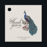 Étiquettes Cadeau Chic ivoire Floral Peacock Merci<br><div class="desc">Ces étiquettes de Merci de Peacock Floral d'ivoire chic présentent un paon bleu et bleu turquoise dessiné à la main et perché sur les branches de Magnolia en pleine floraison dans l'encre noire et le titre "Merci" dans l'élégant script, le tout contre un élégant arrière - plan d'ivoire. Le dos...</div>