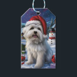 Étiquettes-cadeau Coton De Tulear Winter Wonderland Christmas Joy<br><div class="desc">Ce design festif reflète l'esprit joyeux de la période des fêtes, avec un adorable petit portant un chapeau de Père Noël. Le chien est niché dans un pays des merveilles hivernales, avec un bonhomme de neige, un sapin de Noël décoré et des cadeaux joliment emballés. Les flocons de neige tombent...</div>