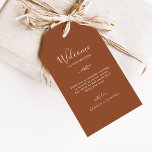 Étiquettes Cadeau de bienvenue pour Mariage en ter<br><div class="desc">Ces étiquettes cadeau de bienvenue mariage en terre cuite minimale sont parfaites pour un mariage boho. Le design se compose d'une simple silhouette de feuille de verdure orangée brûlée et minimaliste de style bohème désert. Personnalisez les étiquettes avec l'emplacement de votre mariage, une brève note de bienvenue, vos noms et...</div>