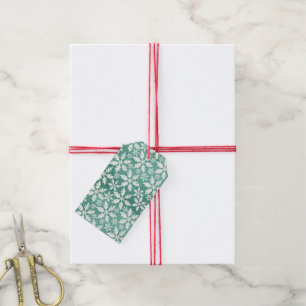 Étiquettes-cadeau Gros flocons blancs tombant sur fond vert