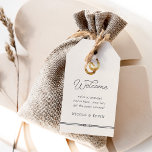 Étiquettes-cadeau Lucky in Love | Rustic Horseshoe Mariage Bienvenue<br><div class="desc">Le design rustique pour les mariages de pays, d'équitation ou de ranch est doté d'un lettrage brun prune foncé aux accents de script, avec "bienvenue" et votre message personnalisé, et d'une paire de fer à cheval doré en haut. Une corde nouée, en fond de fond, vient compléter l'allure de ce...</div>