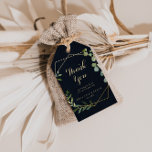 Étiquettes-cadeau Merci de Mariage vert bleu-or géométrique<br><div class="desc">Ces étiquettes de mariage vert bleu or géométrique sont parfaites pour une simple réception de mariage. Le design présente de beaux feuilles verts peints à la main dans un arrière - plan bleu foncé, ornant un cadre géométrique doré. Personnalisez ces balises avec un message court, vos noms et votre date...</div>