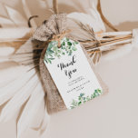 Étiquettes-cadeau Merci Mariage de calligraphie Eucalyptus vert<br><div class="desc">Ces étiquettes de bienvenue de mariage eucalyptus verdoyantes sont parfaites pour une réception de mariage moderne. Le design est composé de beaux feuilles peints à la main et d'eucalyptus verts, assemblés en bouquets soignés pour agrémenter votre événement. Personnalisez ces balises avec un message court, vos noms et votre date de...</div>