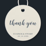 Étiquettes Cadeau Merci simple couleur solide Mariage ivoire<br><div class="desc">Basique couleur solide marque de mariage avec un design minimal avec le message, "merci" dans une élégante police de caractères bleu marine, et votre nom et votre date dans une police serif, sur un arrière - plan d'ivoire. Les polices et les couleurs arrière - plans peuvent être changées en n'importe...</div>