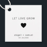 Étiquettes Cadeau Noir moderne et blanc laisser l'amour grandir Mari<br><div class="desc">Les étiquettes de faveur de mariage moderne avec un design minimal avec le message, "Let Love Grow". Ci-dessous est un coeur, vos noms et votre date, en noir, sur un arrière - plan blanc. Les polices et les couleurs arrière - plans peuvent être changées en n'importe quelle couleur. Ces étiquettes...</div>