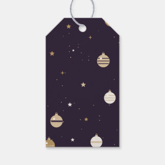 Étiquettes-cadeau Ornements dorés et étoiles sur un prune profond
