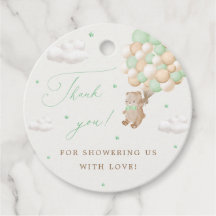 Ours en peluche avec ballons verts Merci