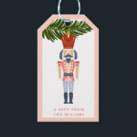 Étiquettes-cadeau Pastel Nutcracker Noël Ornement personnalisé<br><div class="desc">Ce design ornemental vintage de Noël apporte toutes ces bonnes vibrations de nostalgie d'autrefois. Sur le devant de cette étiquette-cadeau se trouve un ornement de noisette accroché à une branche d'arbre de Noël. L'arrière de la carte a un arrière - plan rose avec un motif étoilé rouge. Vous pouvez personnaliser...</div>
