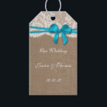 Étiquettes-cadeau Tags Rustic Blue Bow Collection<br><div class="desc">La collection d'arc bleu rustique est un design époustouflant avec un bel arrière - plan rustique effet burlap avec un habillage d'effet de dentelle blanc vintage romantique terminé avec un arc bleu époustouflant. Ces étiquettes peuvent être personnalisées pour votre occasion spéciale et ferait le cadeau parfait ou vous remercier tag...</div>
