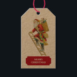 Étiquettes-cadeau Vintage Christmas Santa Claus & Cadeaux Tags cadea<br><div class="desc">Illustration vintage d'une escalade du Père Noël une échelle avec son sac rempli de cadeaux. Idéal pour les cadeaux de Noël et la décoration. Customisez l'étiquette cadeau de Noël avec votre texte et faites-le vous-même.</div>
