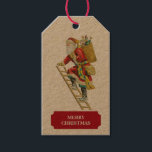 Étiquettes-cadeau Vintage Christmas Santa Claus & Cadeaux Tags cadea<br><div class="desc">Illustration vintage d'une escalade du Père Noël une échelle avec son sac rempli de cadeaux. Idéal pour les cadeaux de Noël et la décoration. Customisez l'étiquette cadeau de Noël avec votre texte et faites-le vous-même.</div>