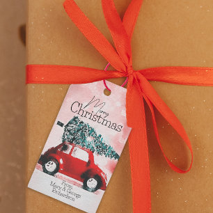 Étiquettes-cadeau Voiture rouge vintage avec un arbre de Noël attach