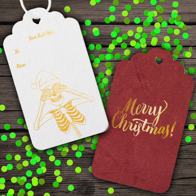 Étiquettes Cadeaux Gold Outline Squelette Ornement Oeil Joyeux Noël (Gold foil fun skeleton ornament eyes, red back with gold Merry Christmas on hanging gift tag.)