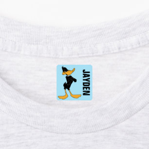 Étiquettes DAFFY DUCK™ avec une couleur croisée des bras