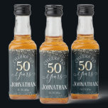 Étiquettes Pour Bouteilles De Liqueur Élégant Gold 50th Birthday Script<br><div class="desc">Jolie parties scintillant en faux or,  faits saillants sur la bordure supérieure et inférieure. Tout le texte est ajustable et facile à changer pour vos besoins de partie. Grand élégant design modèle 50e anniversaire. arrière - plan texturé en bois bleu.</div>