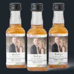 Étiquettes Pour Bouteilles De Liqueur Rustic Lilacs Floral Mariage Merci Photo<br><div class="desc">Ces étiquettes miniatures de bouteilles de liqueur disposent d'un design boho chic rustique floral avec votre photo entourée de lilas aquarelles peints à la main et de verdure dans les tons lavande ou violet clair et vert. La légende est écrite dans la calligraphie en dentelle et dit : Merci pour...</div>