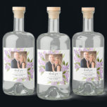 Étiquettes Pour Bouteilles De Liqueur Rustic Watercolor Lilacs Photo Mariage Merci<br><div class="desc">Ces étiquettes de bouteilles d'alcool sont parfaits comme des cadeaux de remerciement pour les membres de votre fête de mariage, des ajouts à un sac de bagage de mariage, ou tout simplement pour votre réception. Le design est rustique mais élégant avec votre photo entourée de fleurs lilas couleur lavande et...</div>