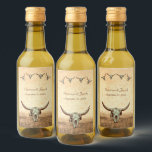 Étiquettes Pour Bouteilles De Vin Western Rustic Mariage Pays Vache Taureau crâne<br><div class="desc">Western rustique mariage taureau crâne de vache brun beige vintage style antique mini bouteille de vin étiquettes. Paysage de style ancienne ferme de campagne design arrière - plan. Un cowboy occidental sauvage inspiré. Quatre crânes dans un motif avec un texte personnalisé. Tendance, cool, fête des animaux de ferme, faveurs pour...</div>