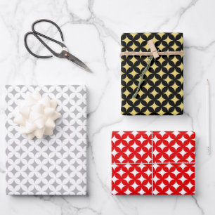 Étoile de diamant sur papier d'emballage noir, rou