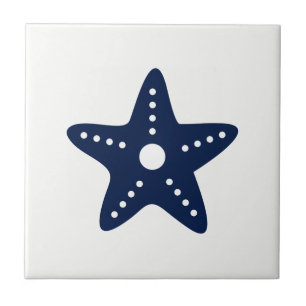 Étoiles de mer bleues sur le carreau de céramique