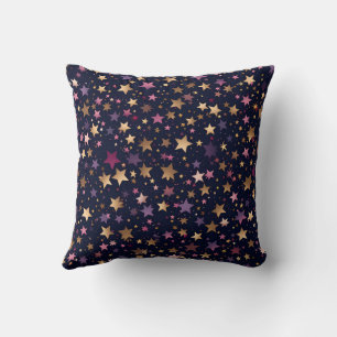 Étoiles violettes et d'or sur oreiller de minuit