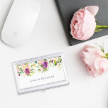 Étui Pour Cartes De Visite Fleur vive | Aquarelle personnalisée Florale<br><div class="desc">Le porte-carte de visite à fleurs chic est doté d'un bouquet en cascade de pivoines peintes à l'aquarelle et de fleurs roses dans des tons vifs de violet violet,  rose et vert,  sur le dessus. Votre nom et/ou votre nom commercial s'affichent sous un élégant lettrage bleu foncé.</div>