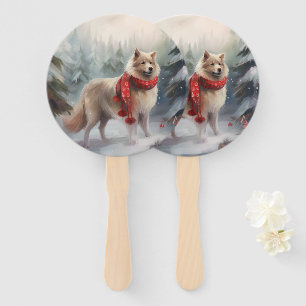 Éventail Chien finnois de Laponie dans la neige de Noël