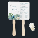 Éventail Turquoise Tropical Flowers Peacock Wedding Program<br><div class="desc">Gardez vos invités cool et élégants avec notre "Fan à main du programme de mariage des fleurs tropicales Turquoises". Ce ventilateur à main unique allie fonctionnalité et élégance, avec un design captivant de plumes de paon turquoises, de fleurs tropicales vibrantes et de feuillage luxuriant. Customisez votre programme de mariage pour...</div>