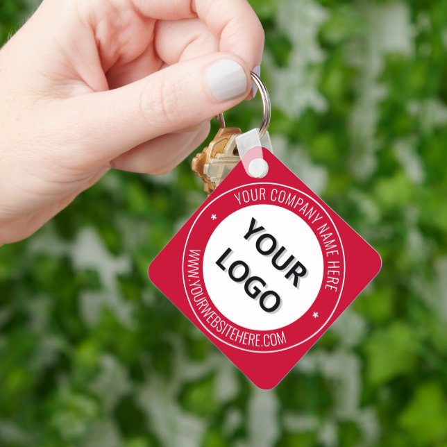 Exemple de porte-clés promotionnel avec logo et te (main)