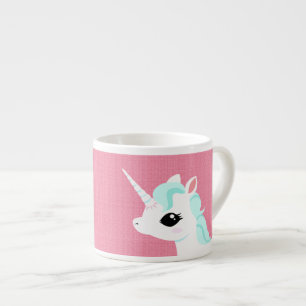 Expresso Petite licorne avec la tasse bleue de café expres