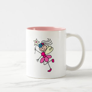 Fée rose d'ange avec la tasse de baguette magique