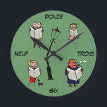 Feu de lecture Vintage Horloge Française<br><div class="desc">Cette horloge murale pratique présente des chiffres et des chiffres de dessins animés vintages en français,  et serait parfait pour le minuscule francophile de votre vie qui cherche à apprendre de nouveaux chiffres !</div>
