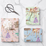 Feuille De Papier Cadeau Baby First Christmas Reindeer Ajouter Baby Name<br><div class="desc">Un premier papier d'emballage de Noël pour bébé pour le jour férié avec rennes et écureuils aquarellés se dirigeant vers le pôle Nord sur trois arrière - plans de couleur pastel. Le nom du bébé et un accueil de vacances peuvent être customisés sur ce papier.</div>