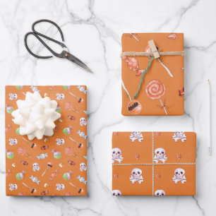 Feuille De Papier Cadeau Bonbons d'Halloween et aquarelle de crâne