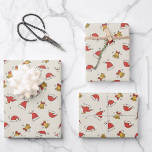 Feuille De Papier Cadeau Chapeau festif de Père Noël et motif de grelots