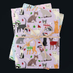 Feuille De Papier Cadeau Christmas Cats Pastel<br><div class="desc">Chat blanc mignon,  chat noir,  chat tabby,  chat persan,  chat siamois et chat tuxedo habillés de tenues de vacances festives,  chapeaux de Père Noël et chandails Jacquards avec motif pastel parsemé d'ornements de Noël.</div>